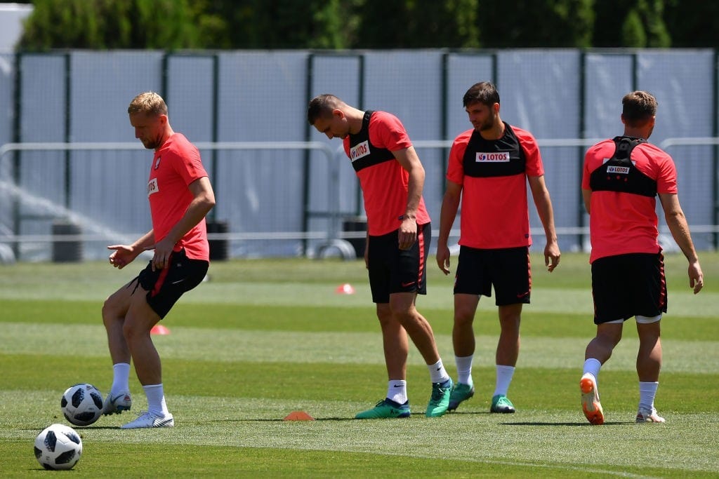 Fit again Kamil Glik (L) will solidify Poland's rearguard (Photo by NELSON ALMEIDA/AFP/Getty Images)