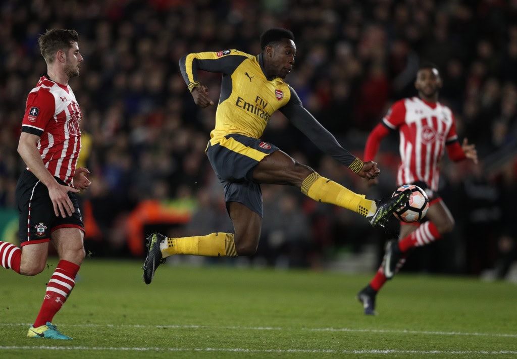 Arsenal's English striker Danny Welbeck (C) scores his team's second goal during the English FA Cup fourth round football match between Southampton and Arsenal at St Mary's in Southampton, southern England on January 28, 2017. / AFP / Adrian DENNIS / RESTRICTED TO EDITORIAL USE. No use with unauthorized audio, video, data, fixture lists, club/league logos or 'live' services. Online in-match use limited to 75 images, no video emulation. No use in betting, games or single club/league/player publications. / (Photo credit should read ADRIAN DENNIS/AFP/Getty Images)