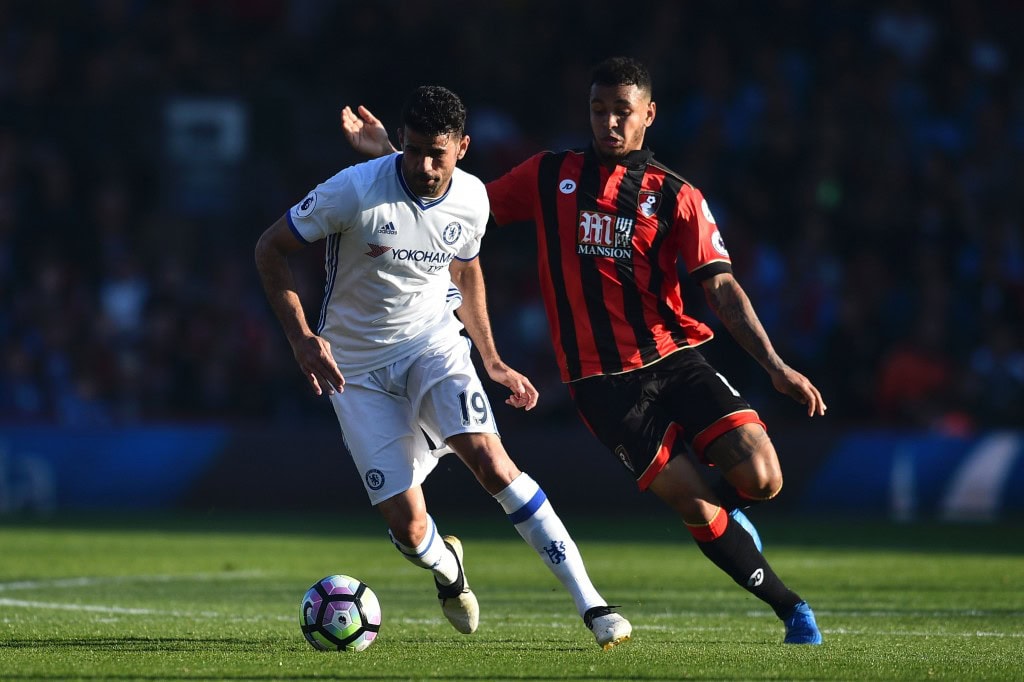 Bournemouth's Norwegian striker Joshua King (R) chases Chelsea's Brazilian-born Spanish striker Diego Costa (L) during the English Premier League football match between Bournemouth and Chelsea at the Vitality Stadium in Bournemouth, southern England on April 8, 2017. / AFP PHOTO / Glyn KIRK / RESTRICTED TO EDITORIAL USE. No use with unauthorized audio, video, data, fixture lists, club/league logos or 'live' services. Online in-match use limited to 75 images, no video emulation. No use in betting, games or single club/league/player publications. / (Photo credit should read GLYN KIRK/AFP/Getty Images)