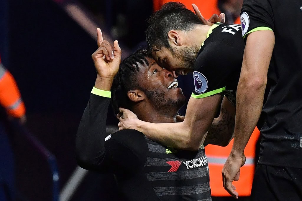 Chelsea's Belgian striker Michy Batshuayi (L) celebrates with teammates scoring the opening goal during the English Premier League match between West Bromwich Albion and Chelsea at The Hawthorns stadium in West Bromwich, west Midlands on May 12, 2017. / AFP PHOTO / Anthony Devlin (Photo credit should read ANTHONY DEVLIN/AFP/Getty Images)