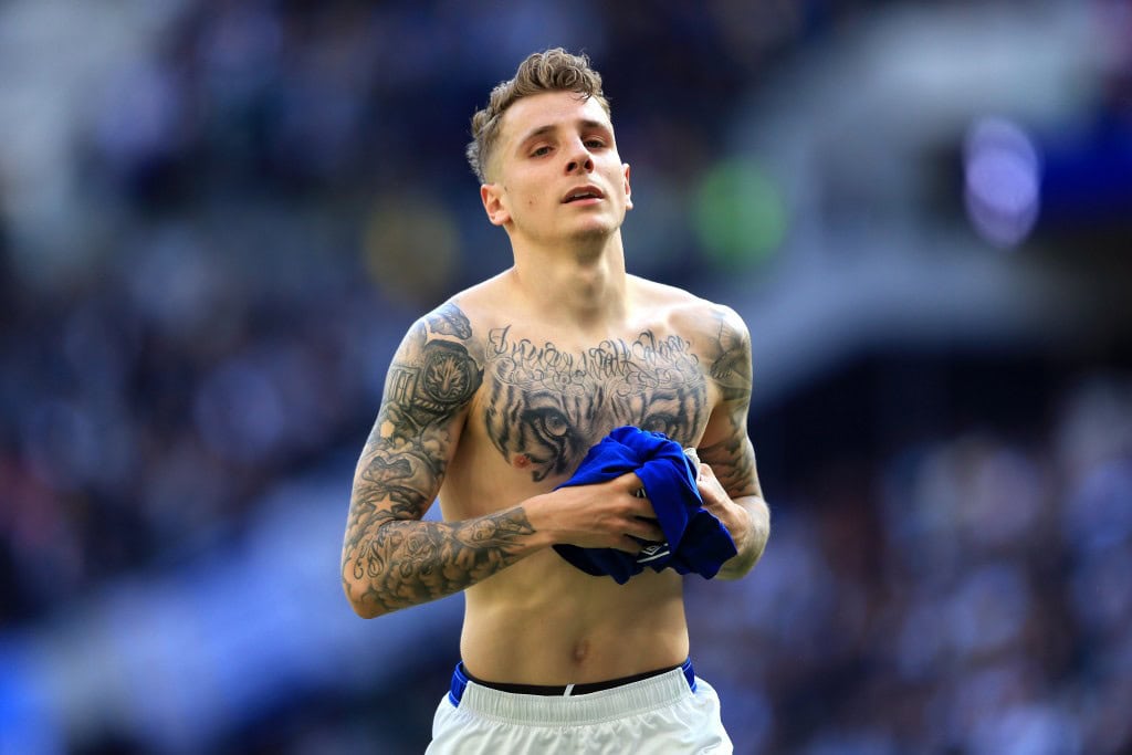 LONDON, ENGLAND - MAY 12: Lucas Digne of Everton takes his shirt to an Everton supporter after the Premier League match between Tottenham Hotspur and Everton FC at Tottenham Hotspur Stadium on May 12, 2019 in London, United Kingdom. (Photo by Stephen Pond/Getty Images)