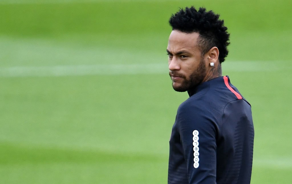 Paris Saint-Germain's Brazilian forward Neymar looks on as he takes part in a training session in Saint-Germain-en-Laye, west of Paris, on August 17, 2019, on the eve of the French L1 football match between Paris Saint-Germain (PSG) and Rennes. (Photo by FRANCK FIFE / AFP) (Photo credit should read FRANCK FIFE/AFP/Getty Images)