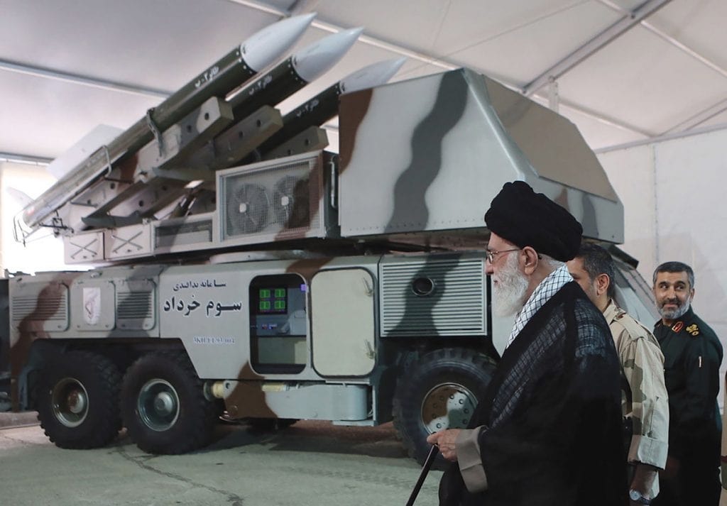 epa07662745 A handout file picture made available by Iranian Supreme Leader Office shows Iranian Supreme Leader Ali Khamenei next to Khordad-3 missile system during a revolutionary guard air force achievement exhibition in Tehran, 11 May 2014 (issued 21 June 2019). Media reported on 20 June 2019 that a US surveillance drone RQ-4A was shot down by an Iranian surface-to-air missile. Iran claims that the drone was in Iran airspace as US says the drone was flying over international water. EPA/HO HANDOUT HANDOUT EDITORIAL USE ONLY/NO SALES