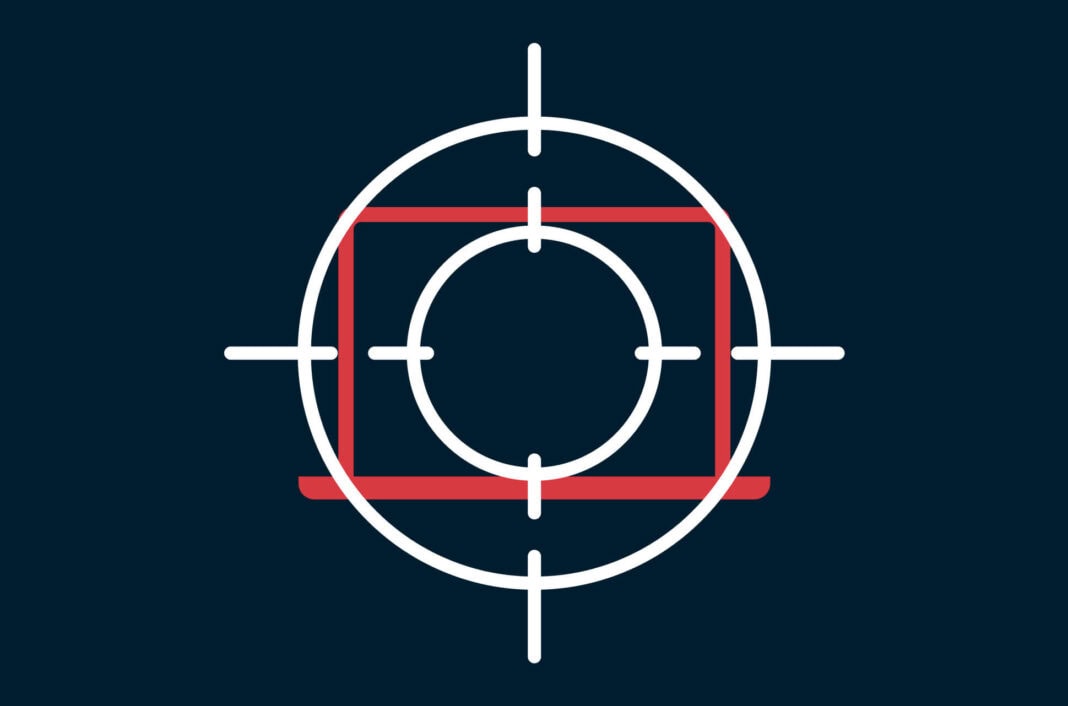 Laptop with crosshairs.