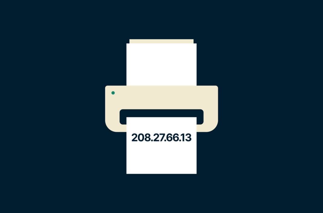 A printer with an IP address on a piece of printed paper.