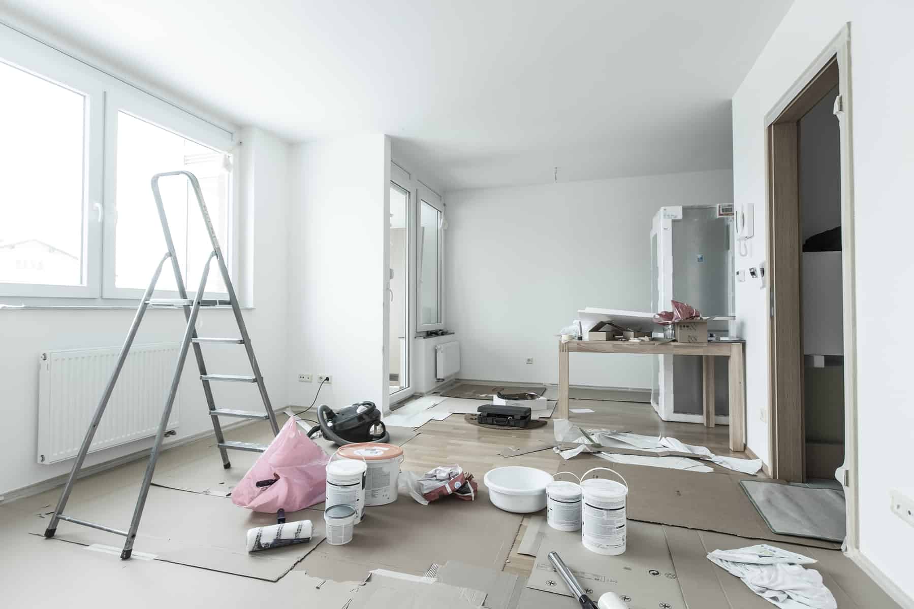 home renovation Home renovation in room full of painting tools