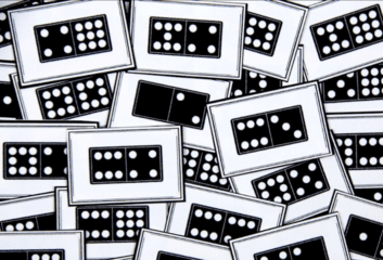 Photo of dominoes printed on cards.