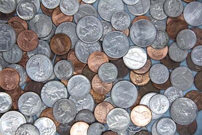 A pile of real coins that a teacher can use to teach counting money.