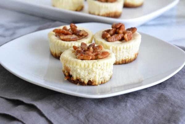 Pecan Topped Mini Cheesecakes with Gingersnap Crust is low in sugar and rich in protein. Made with low sugar yogurt and stevia. Perfect for your holiday dessert.