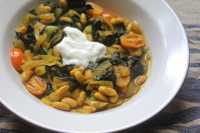 Curried White Beans and Kale with Cherry Tomatoes