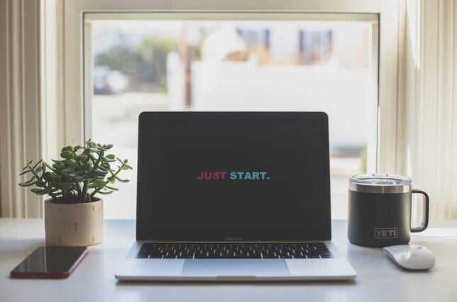 new moon beginnings just start quote on laptop
