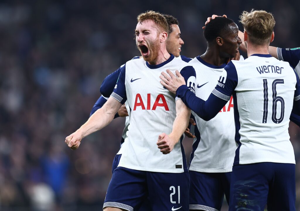 Tottenham players celebrate after scoring goal