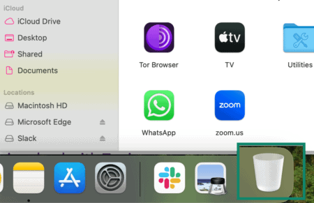 Tor Browser icon being dragged from the Applications folder to the Trash on macOS to uninstall it.