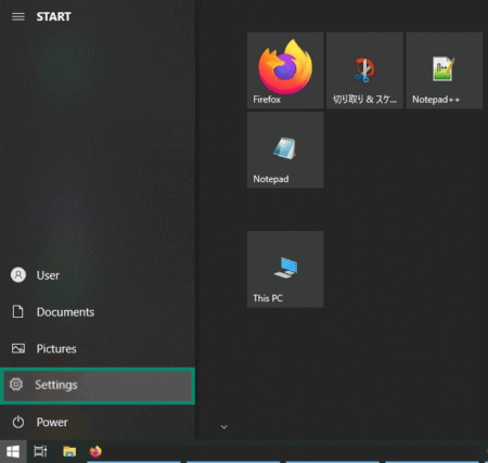 Windows start menu with the Settings option highlighted.
