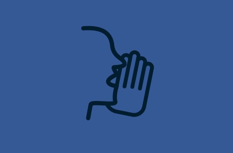 Someone whispering with a hand up.