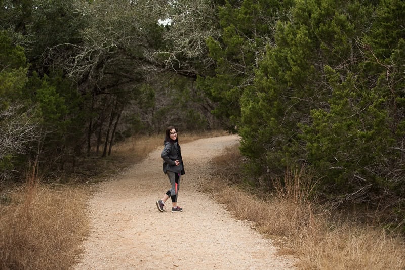 Brooke posing on the walking trail back to the car