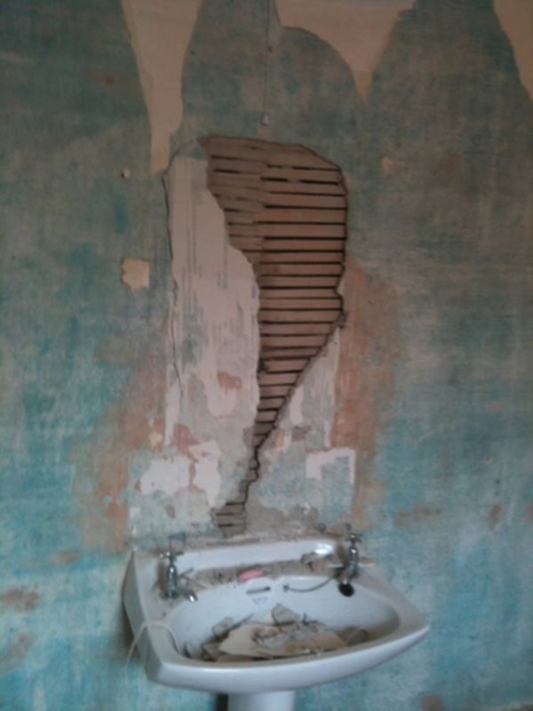 Tiling Onto Poorly Adhered Plaster Is Not Recommended With Bathroom Installation In Leeds
