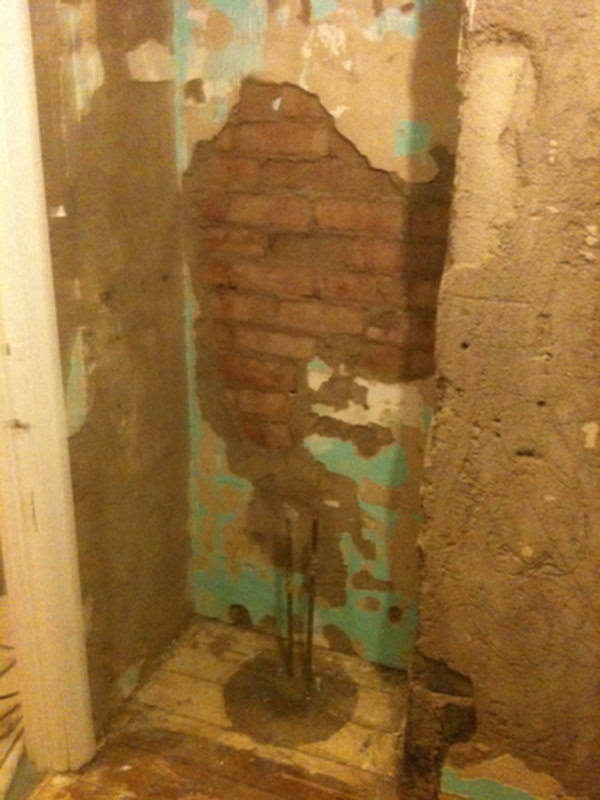 Blown Render Needs To Be Removed And Made Good Prior To Re Tiling With Bathroom Installation In Leeds
