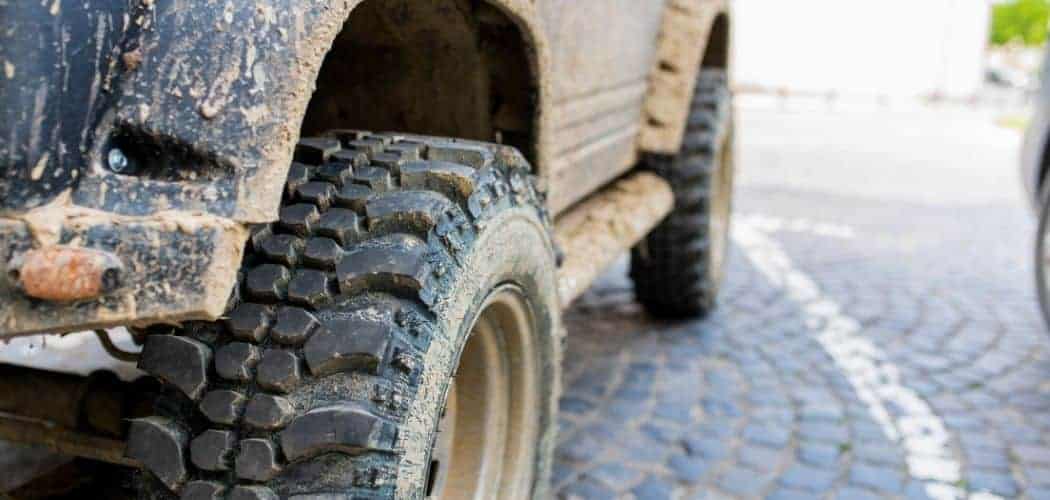 tires with mud of a Jeep Wrangler
