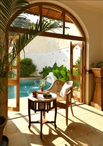 Outdoor seating with a pool