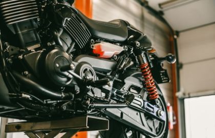 classic motorcycle in a jack or lift