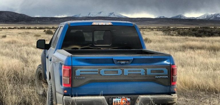 blue Ford F150 with battery inside