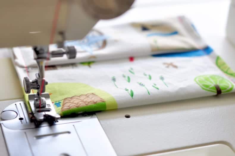 The outer seams of the snack bags are sewn on a sewing machine.