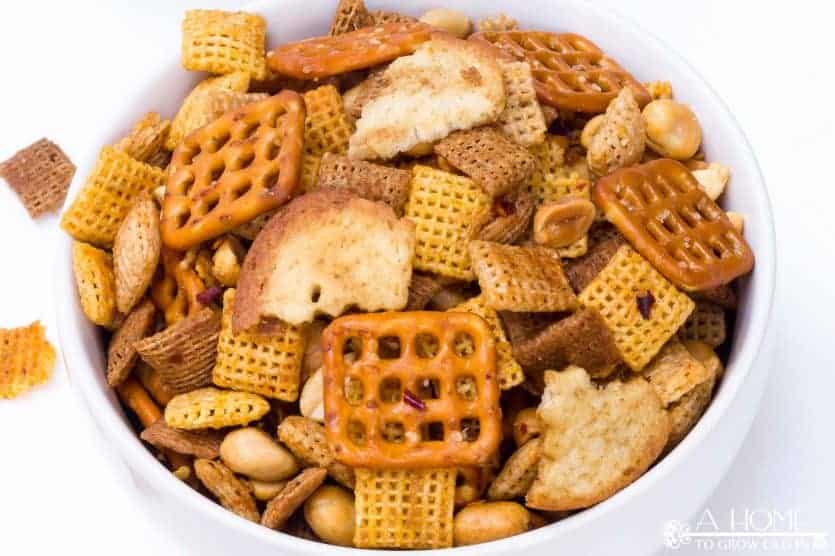 Looking for the ultimate snack recipe for your football watching party? This spicy Sriracha Chex mix recipe has just the right amount of heat! It is sure to be a game-day favorite.