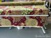 The William Morris quilt on a quilt rack for ease of hand-tying the fleece backing and the velvet top together with embroidery floss of coordinating colors