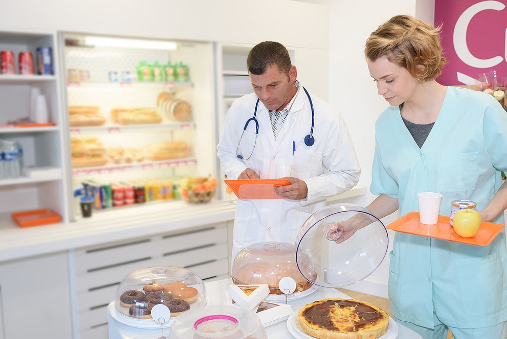 medical staff in modern hospital canteen