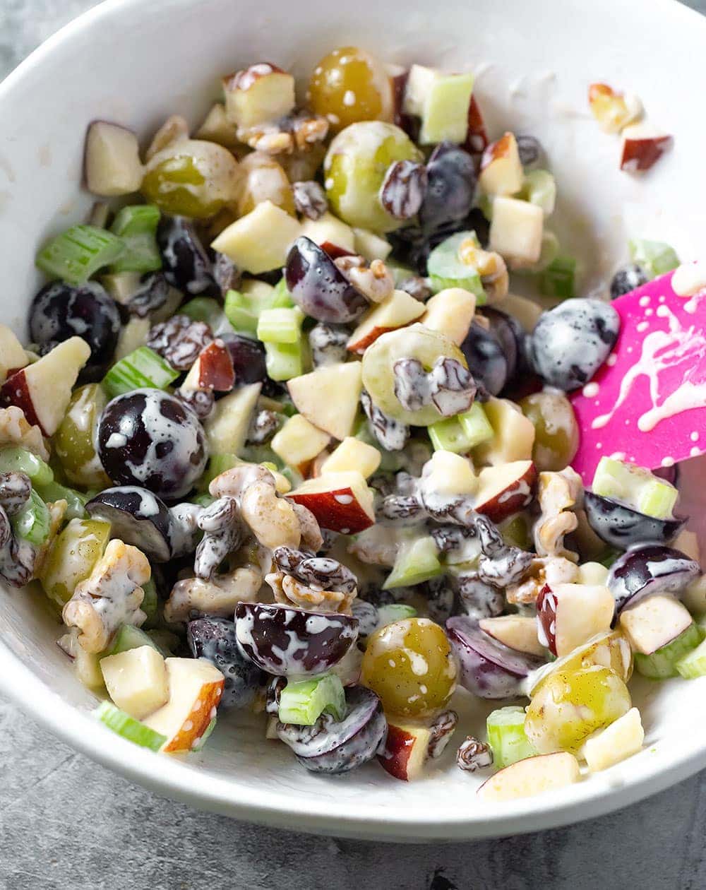 waldorf salad in a white bowl