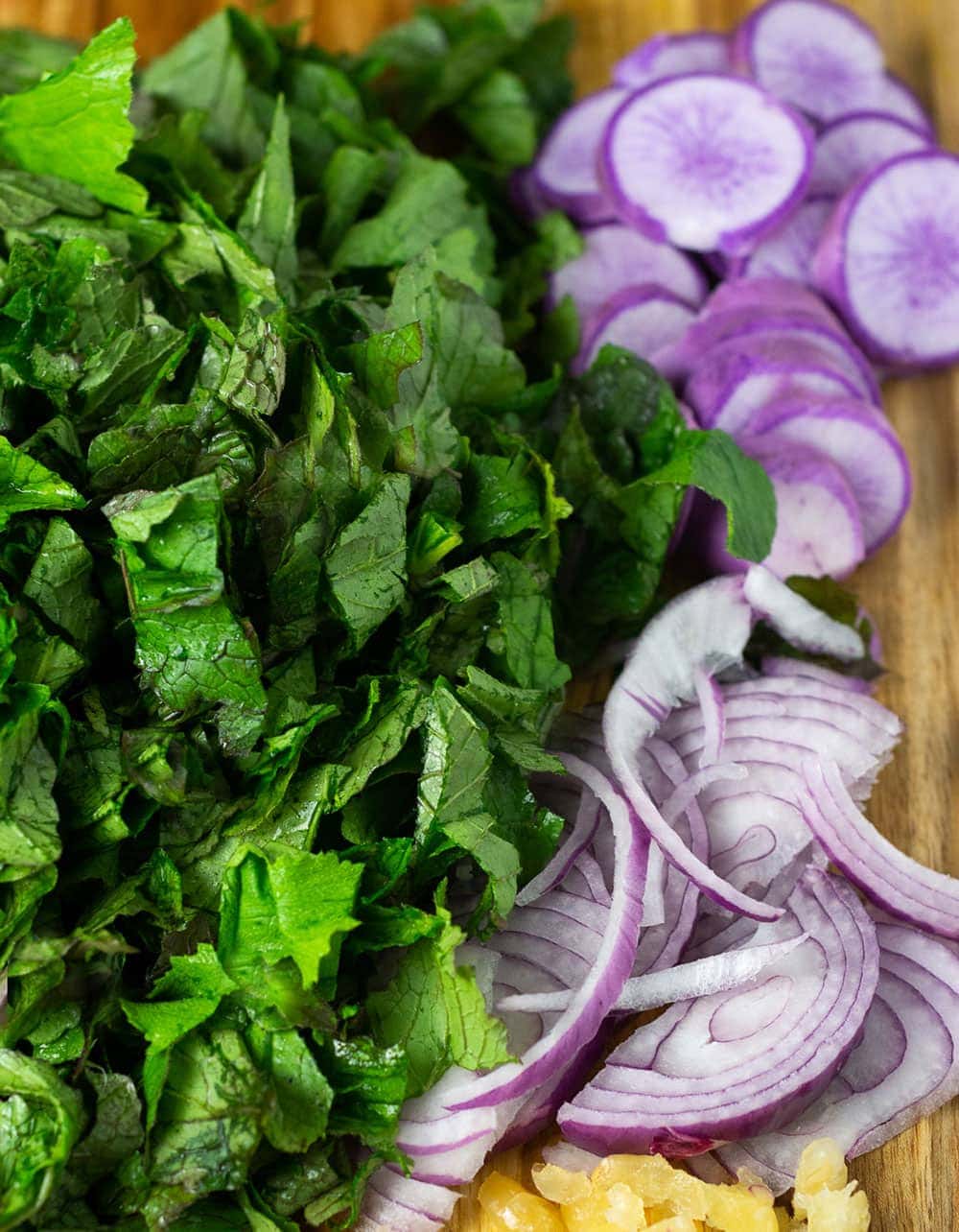 Chopped green radish leaves, purple radish slice