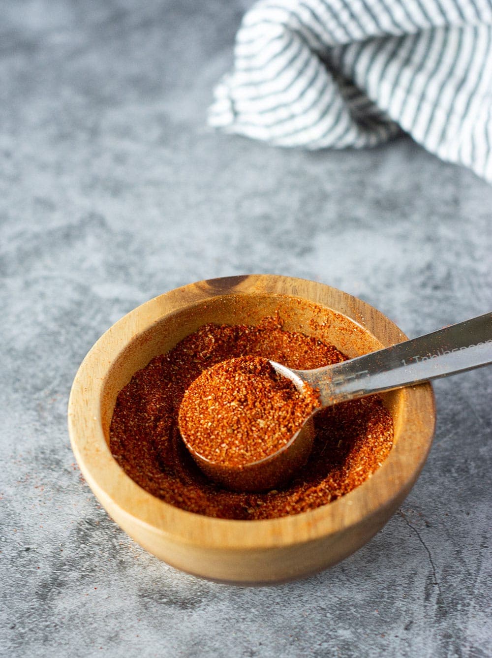 homemade chili in a wooden bowl