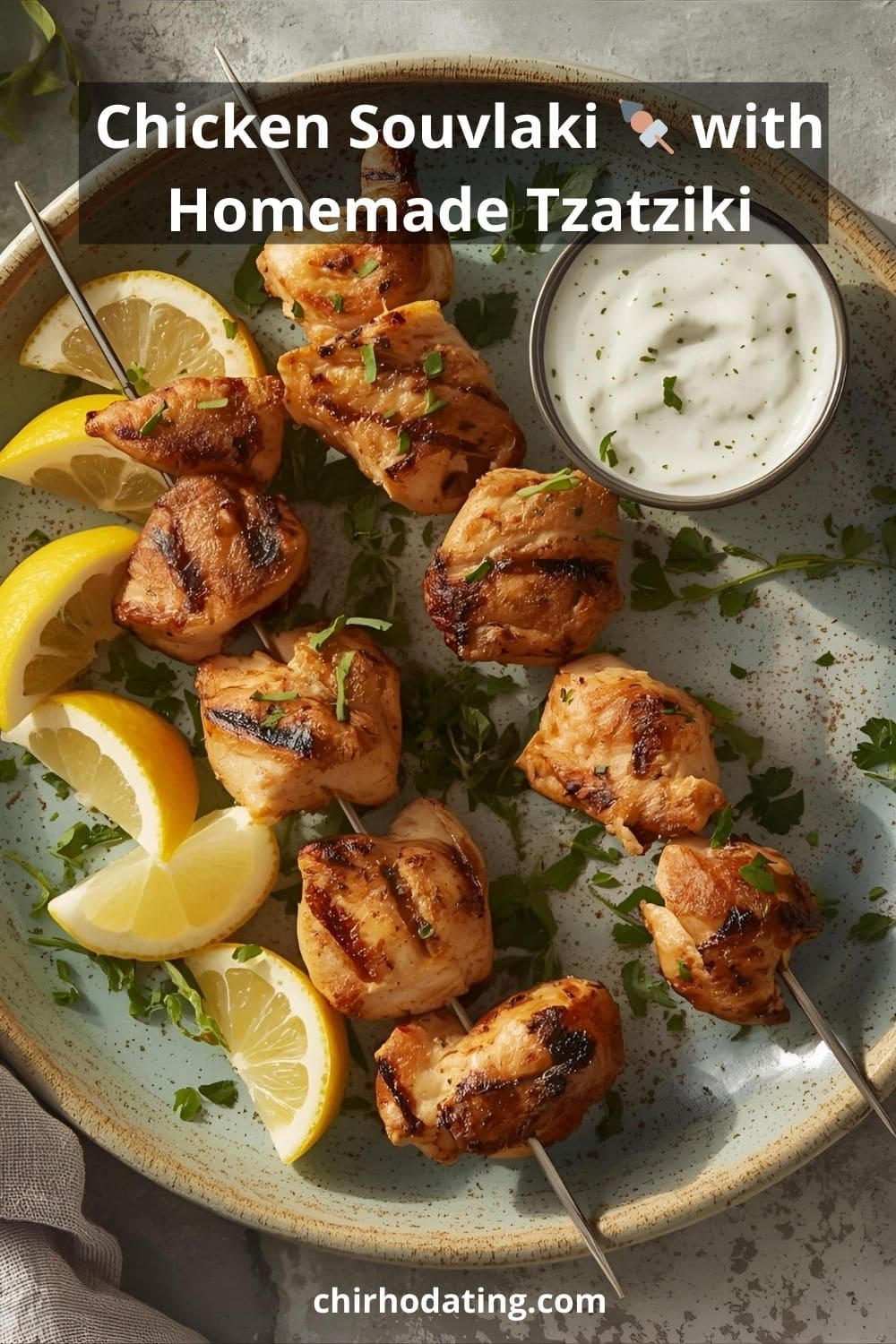 Grilled chicken souvlaki skewers with tzatziki sauce.