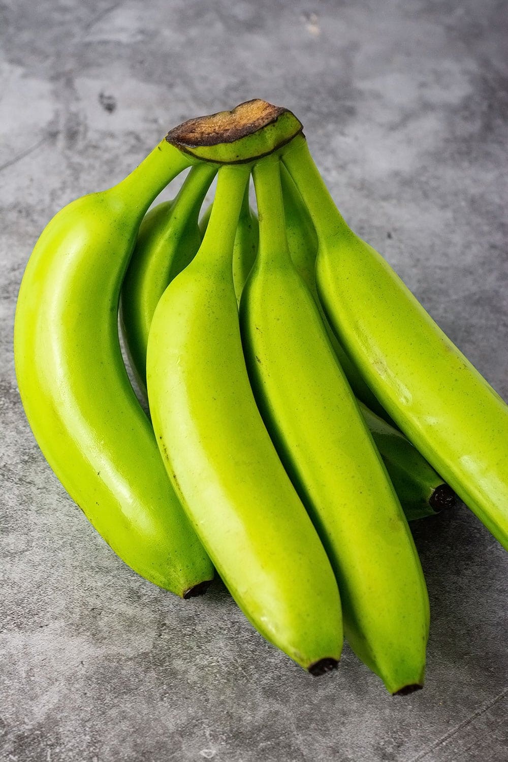 Green banana on a marble background