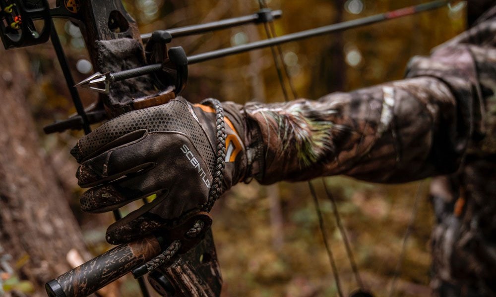guy holding compound bow