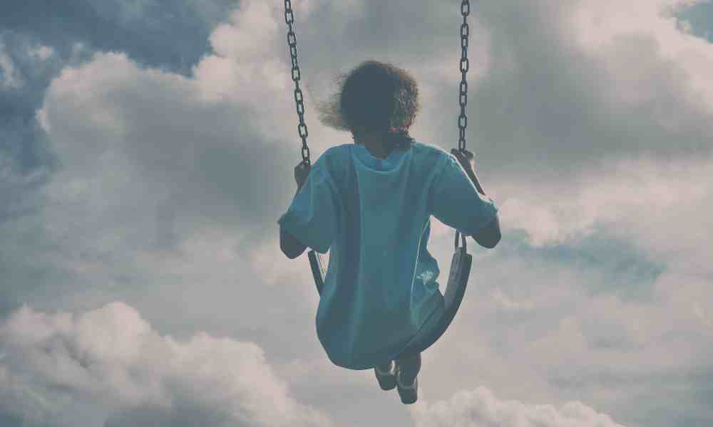 child swinging