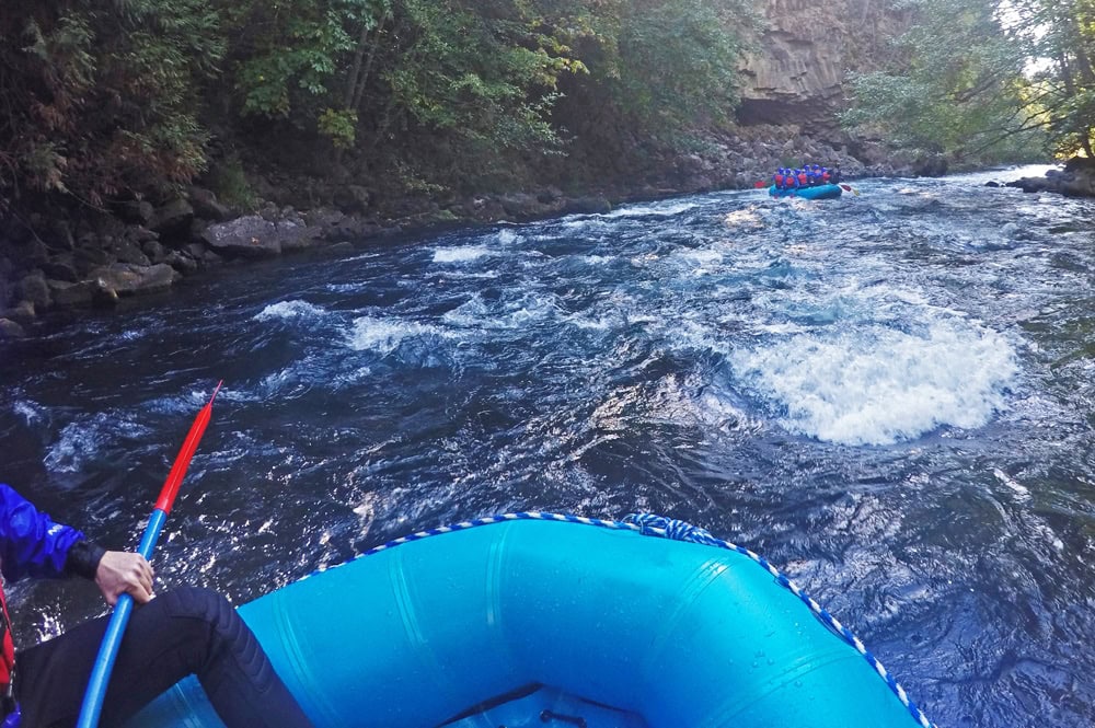 Taking a break and enjoying the views during our whitewater rafting trip down the White Salmon River