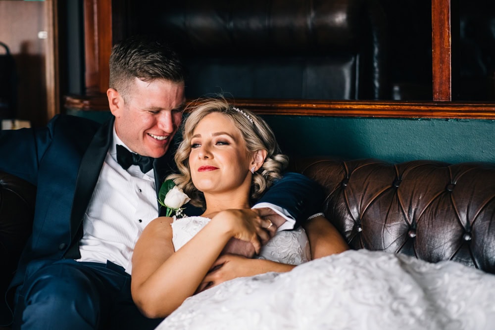 bride lounging with groom