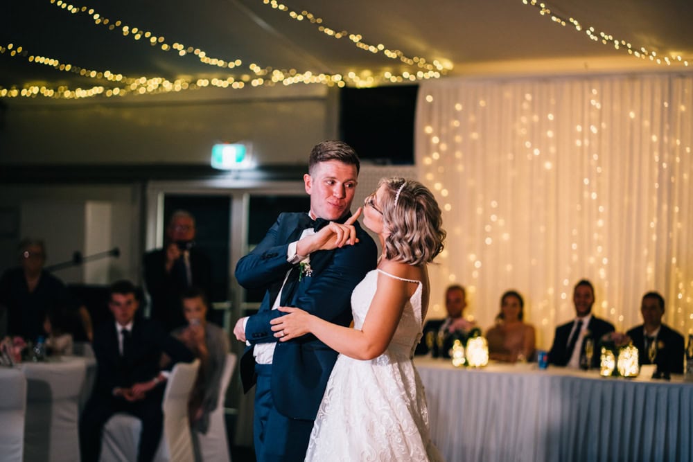 bride and groom dancing