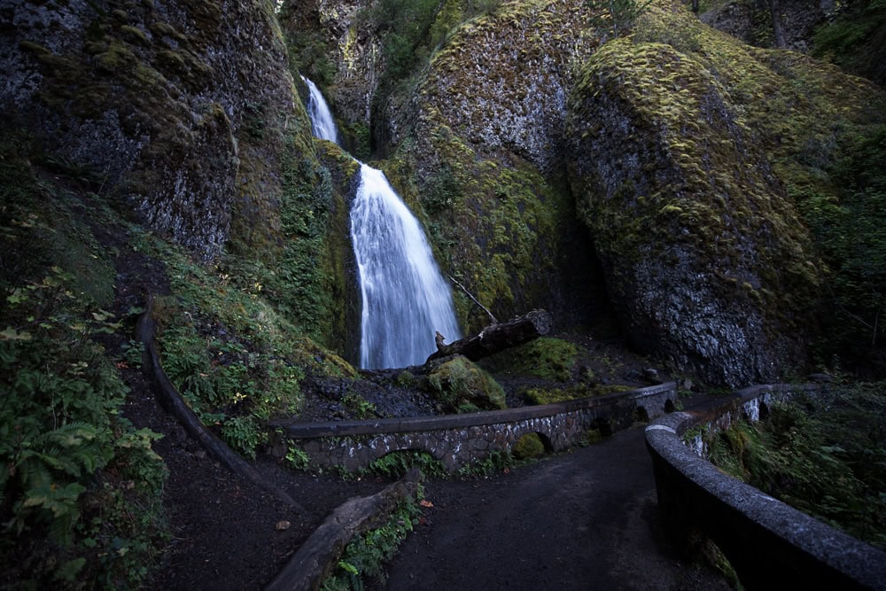 Wahkeena Falls and stone bridge in front of it.