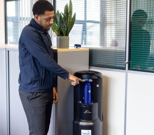 Man using water cooler
