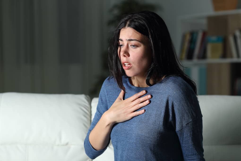 Woman suffering an anxiety attack