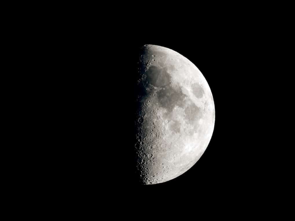 first quarter moon telescopic image