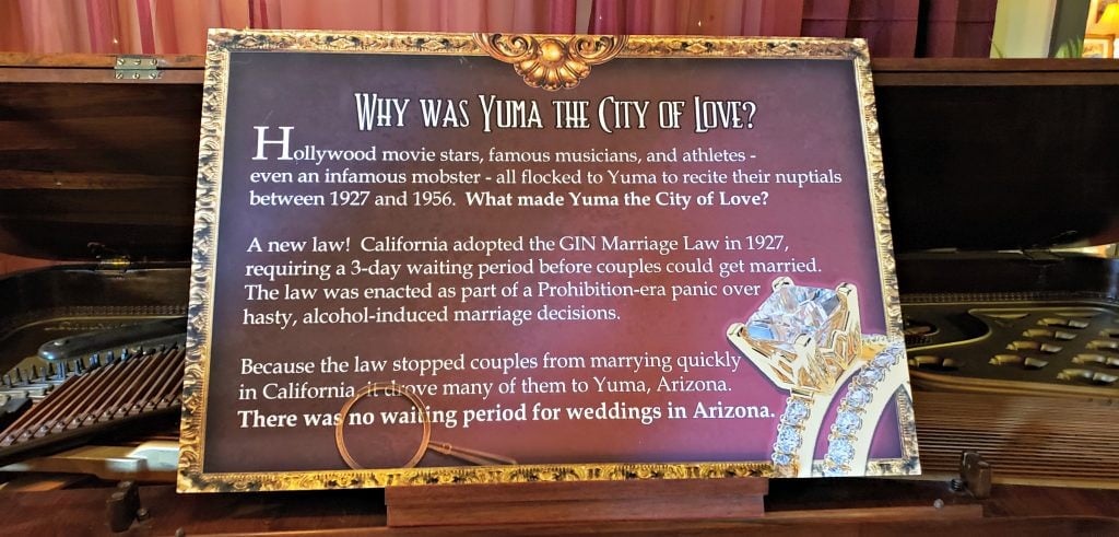 A sign posted in the museum asks 'Why was Yuma the City of love?" is embellished with a picture of a diamond engagement ring.