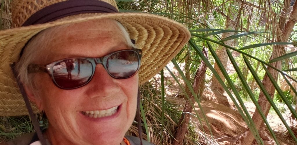 UNSTOPPABLE STacey in front of palm frond