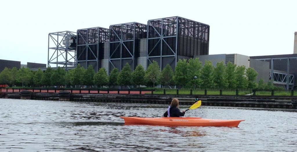 UNSTOPPABLE Stacey paddles by Harley-Davidson Museum on one of the kayak tours in Milwaukee.