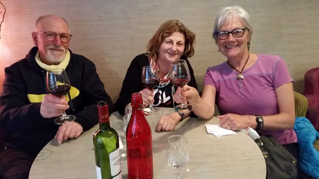 Author Unstoppable Stacey sits with two friends at affordable Bordeaux restaurant during visit Bordeaux France