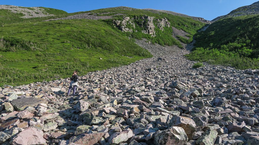 Brooke hiking up the rock gully during our hike to the summit of Gros Morne Mountain