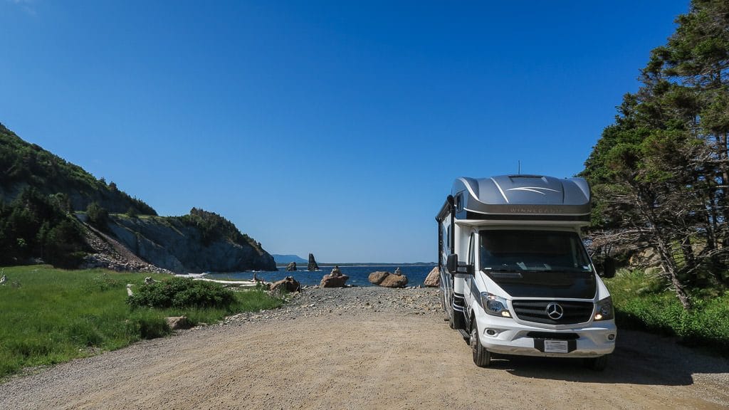 Our Winnebago View parked next to the ocean along the Cabot Trail